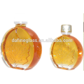 medal shaped glass bottle medallion glass packaging for maple syrup
